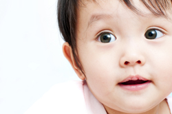 Cute close up of baby girl 250px